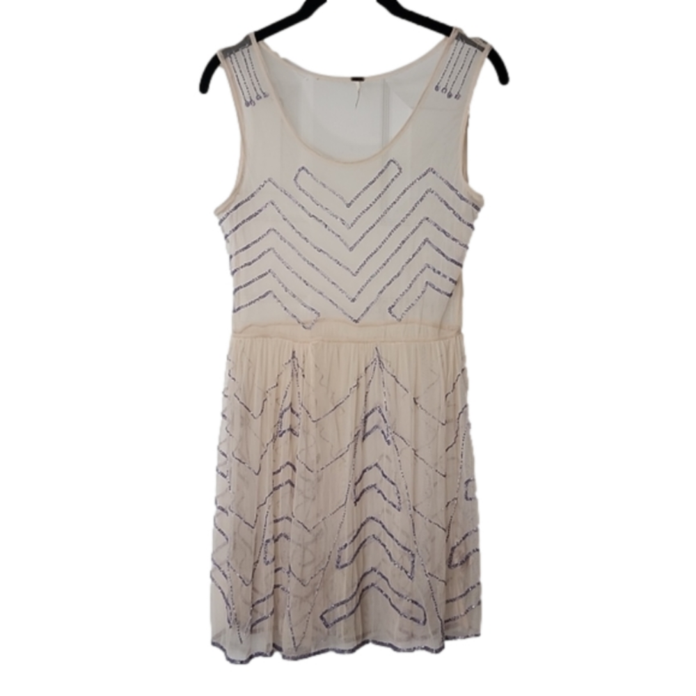FREE PEOPLE XS sheer cream dress with lavender colored beading.